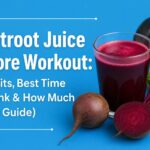 Glass of fresh beetroot juice with whole and sliced beetroots before workout for better energy, endurance, and exercise performance.